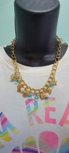 Gold sea lovers necklace